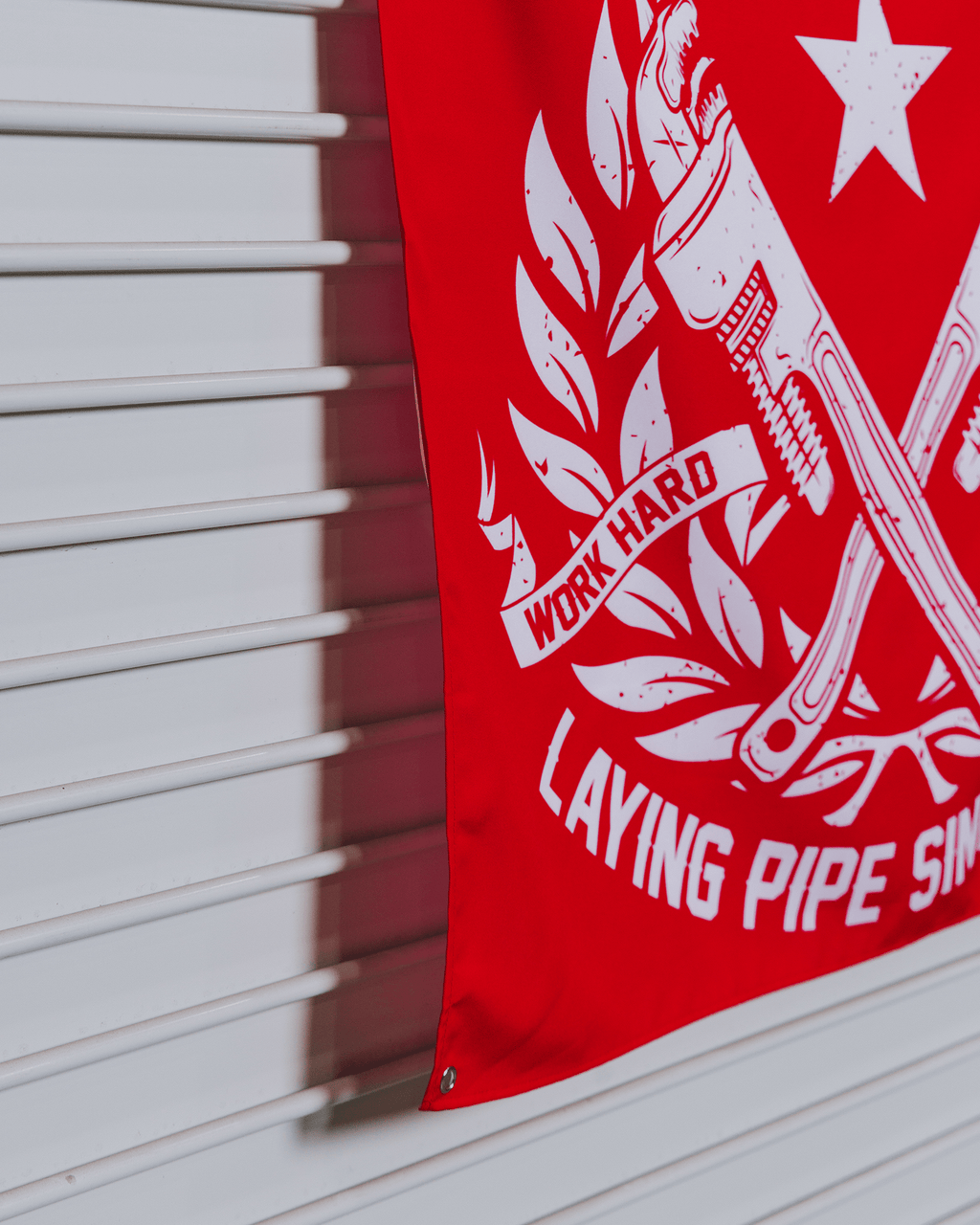 Laying Pipe Garage Banner - 36" x 36"